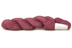 A photo of a framboise colored hank of CoBaSi sock yarn.