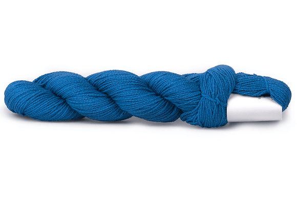 A photo of a royal blue hank of CoBaSi sock yarn.