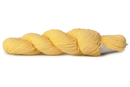 A photo of a butter colored hank of CoBaSi sock yarn.