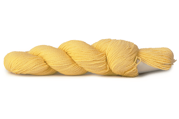 A photo of a butter colored hank of CoBaSi sock yarn.