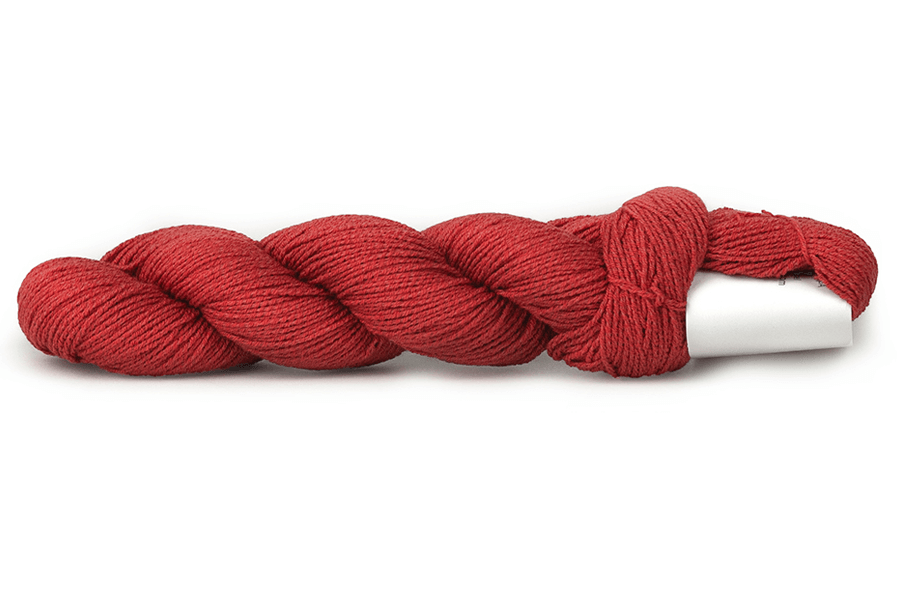 A photo of a red hank of CoBaSi sock yarn.