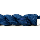 A photo of a blue hank of CoBaSi sock yarn.