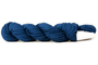 A photo of a blue hank of CoBaSi sock yarn.