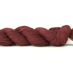 A photo of a wine colored hank of CoBaSi sock yarn.