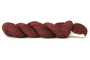 A photo of a wine colored hank of CoBaSi sock yarn.