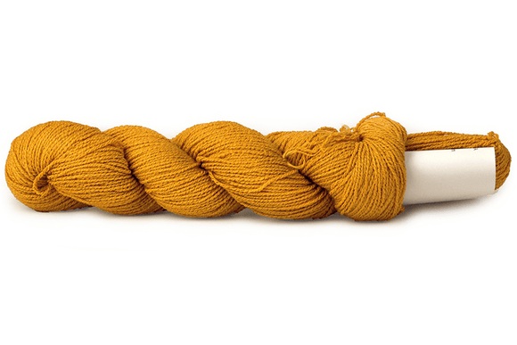 A photo of a mustard colored hank of CoBaSi sock yarn.