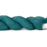 A photo of a teal hank of CoBaSi sock yarn.