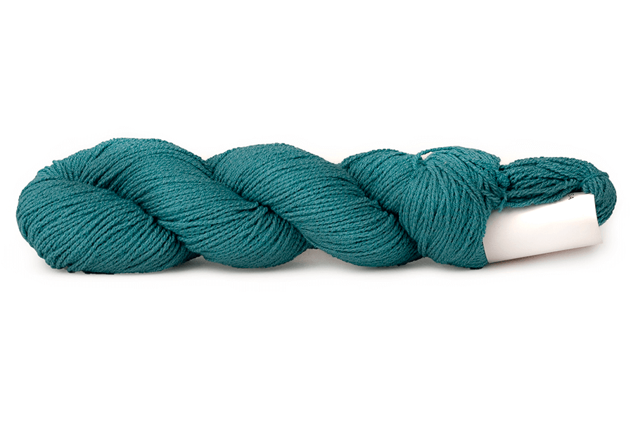 A photo of a teal hank of CoBaSi sock yarn.