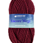 A red skein of Plymouth Encore Mega yarn