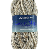 A white and taupe skein of Plymouth Encore Mega Colorspun yarn