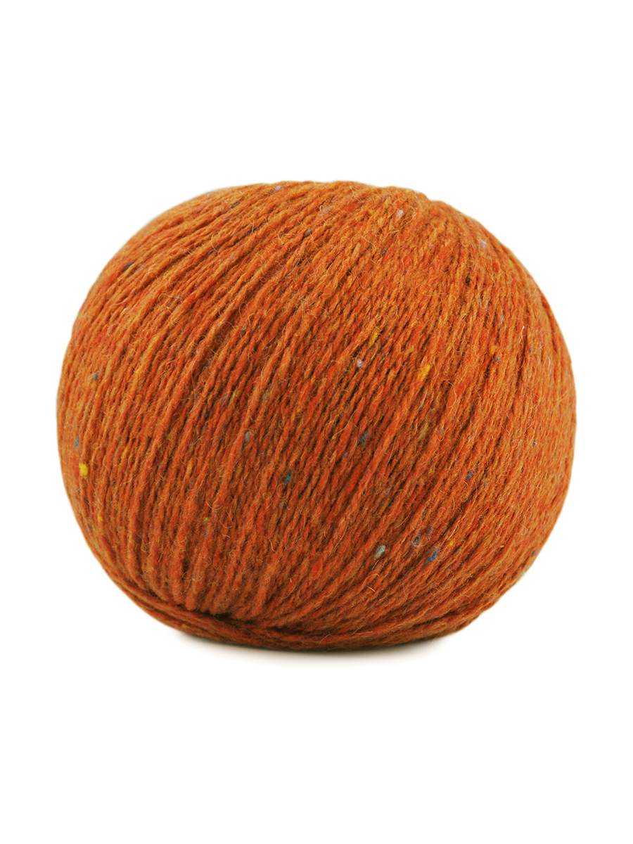 An orange skein of Jody Long Alba yarn
