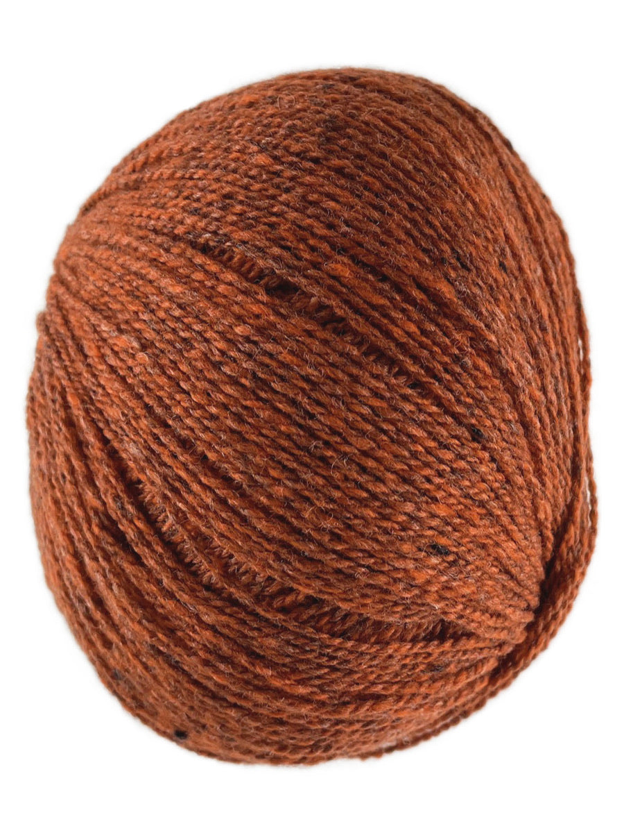 An orange skein of Queensland Collection Kathmandu yarn