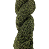 A green marled skein of Mountain Meadow Wool Cora yarn