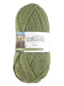 A green skein of Plymouth Galway yarn