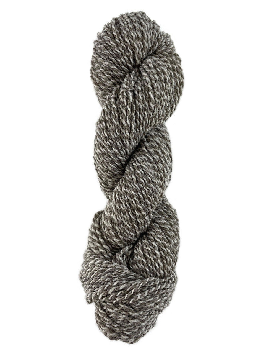 A neutral tweed skein of Mountain Meadow Wool Tweed Sport yarn