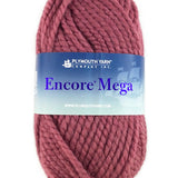 A pink skein of Plymouth Encore Mega yarn