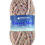 A taupe pink blue skein of Plymouth Yarn Encore Mega Colorspun yarn