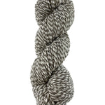 A natural marled skein of Mountain Meadow Wool Cora yarn