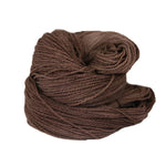 A brown hank of the Mountain Meadow Wool Saratoga yarn collection