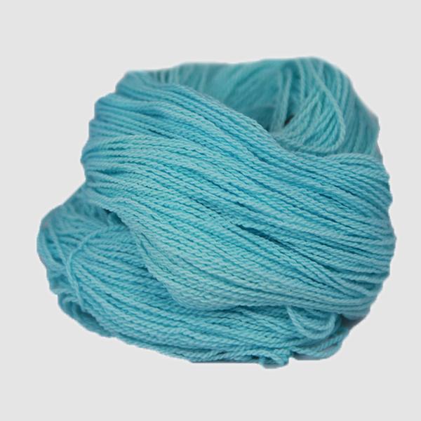 A light blue hank of the Mountain Meadow Wool Saratoga yarn collection