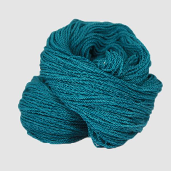 A teal hank of the Mountain Meadow Wool Saratoga yarn collection