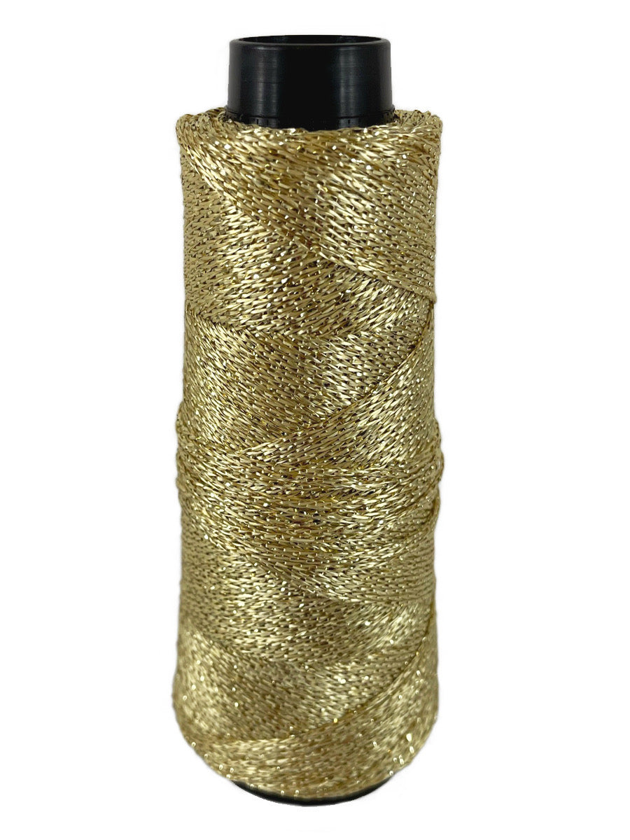 A gold cone of Lincatex Gold Rush yarn