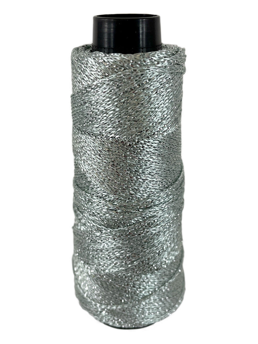 A silver green cone of Lincatex Gold Rush yarn