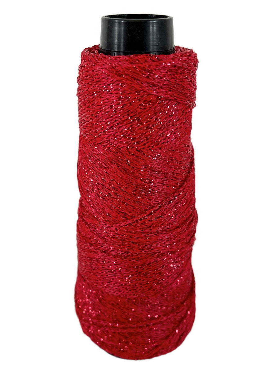 A red cone of Lincatex Gold Rush yarn
