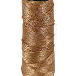 A copper cone of Lincatex Gold Rush yarn