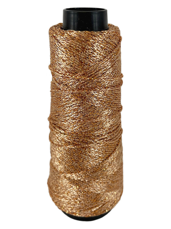 A copper cone of Lincatex Gold Rush yarn