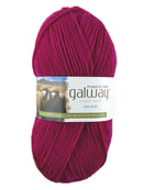 A pink skein of Plymouth Yarn Galway yarn