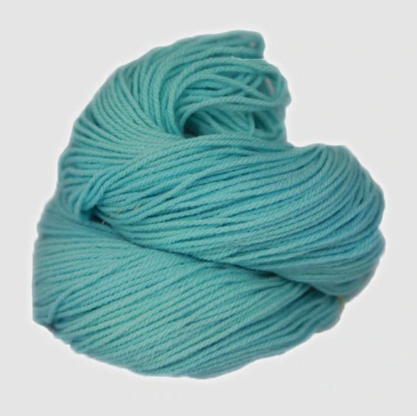 A light blue hank of the Mountain Meadow Wool Alpine collection.