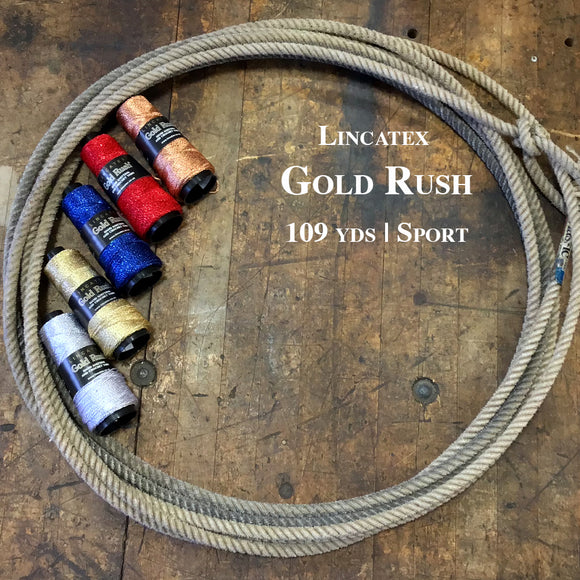 Five cones of Lincatex Gold rush in a lasso laying on a wooden surface