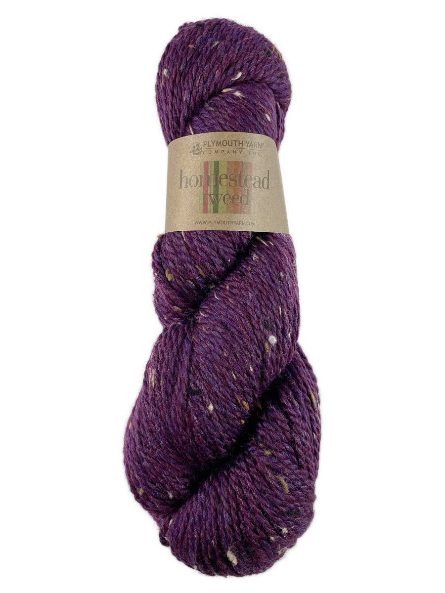A purple tweed skein of Plymouth Homestead Tweed yarn