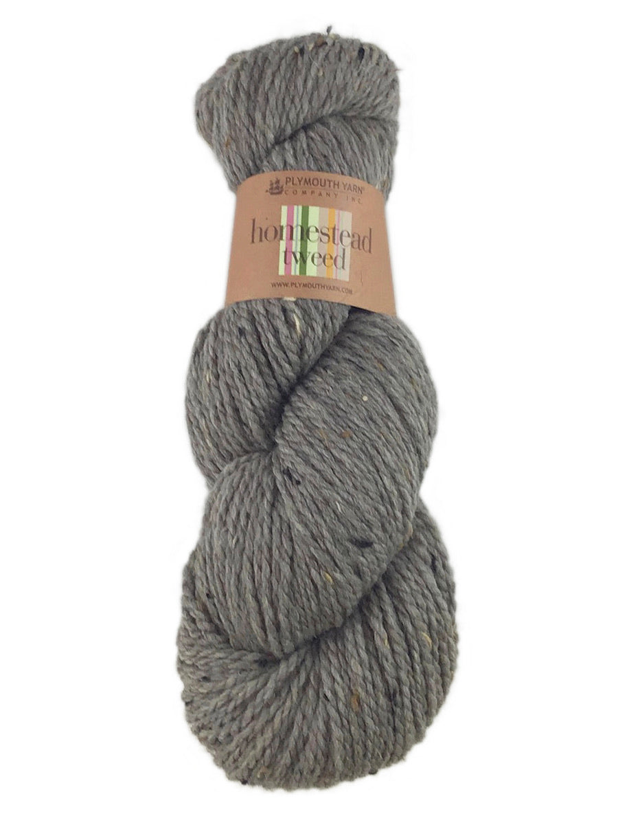 A taupe skein of Pymouth Yarn Homestead Tweed yarn