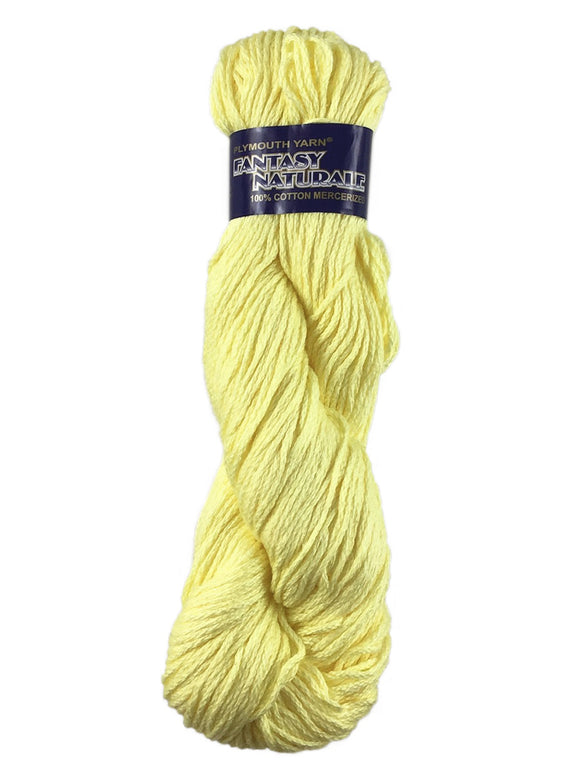 A yellow skein of Plymouth Fantasy Naturale yarn