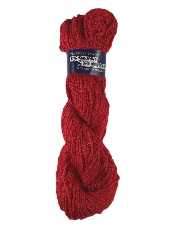 A red skein of Plymouth Fantasy Naturale yarn
