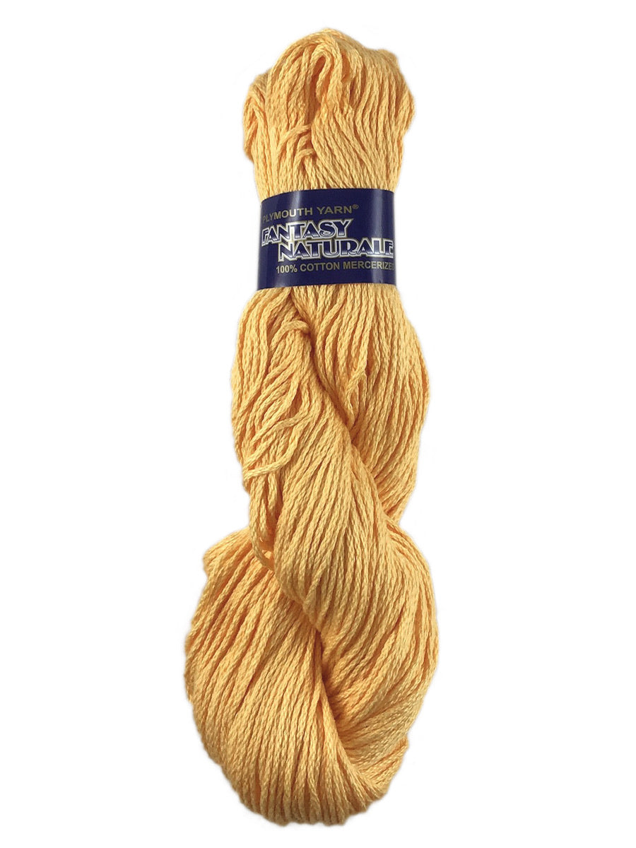 A yellow skein of Plymouth Fantasy Naturale yarn