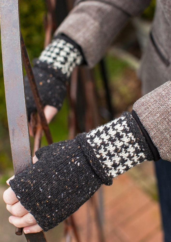 Person wearing mittens