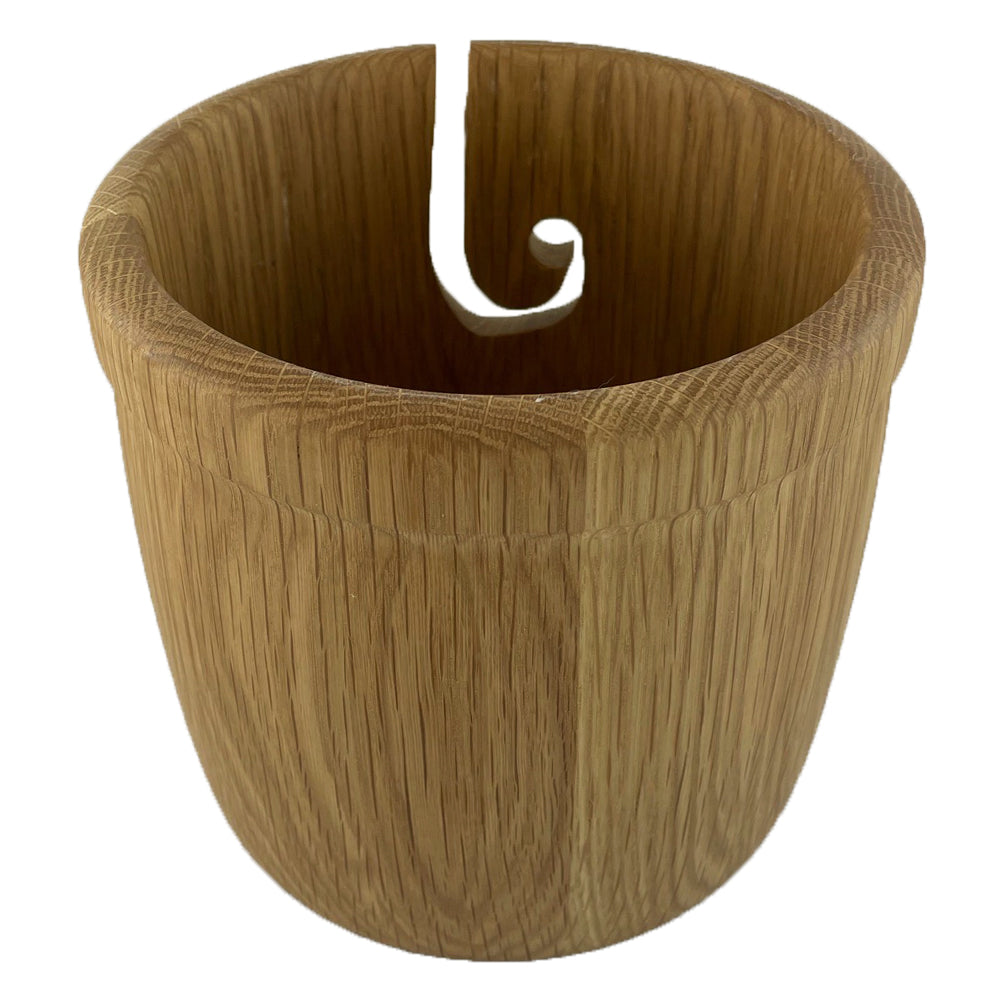 A wooden yarn bowl made from Oak Wood