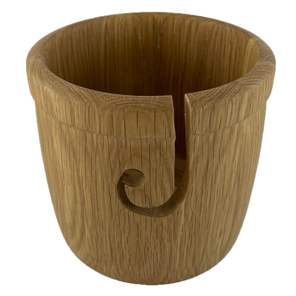 A wooden yarn bowl made from Oak Wood