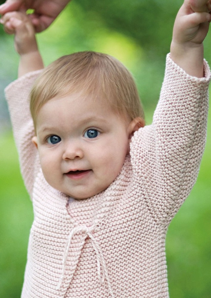 Baby wearing sweater