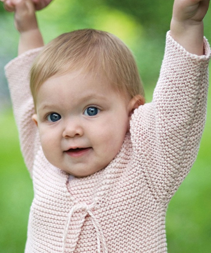 Baby wearing sweater