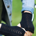 Woman wearing fingerless mitts