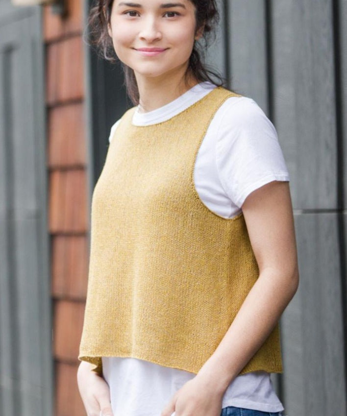 Woman wearing sleeveless pullover