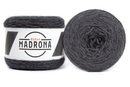 A photo of two dark gray cakes of HiKoo Madrona yarn