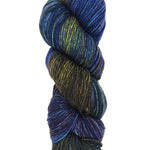 A colorful skein of blue and brown Malabrigo Rios yarn