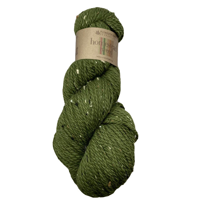 A green skein of Plymouth Homestead Tweed yarn