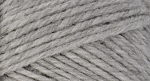 A close-up photo of a gray sample of Nature Spun yarn