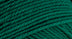 A close-up photo of a green sample of Nature Spun yarn